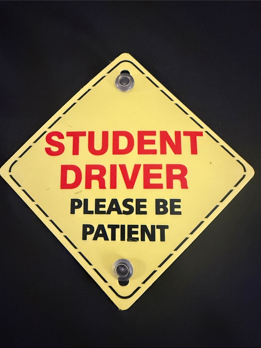 Yellow Student Driver Sign with Red and Black Lettering